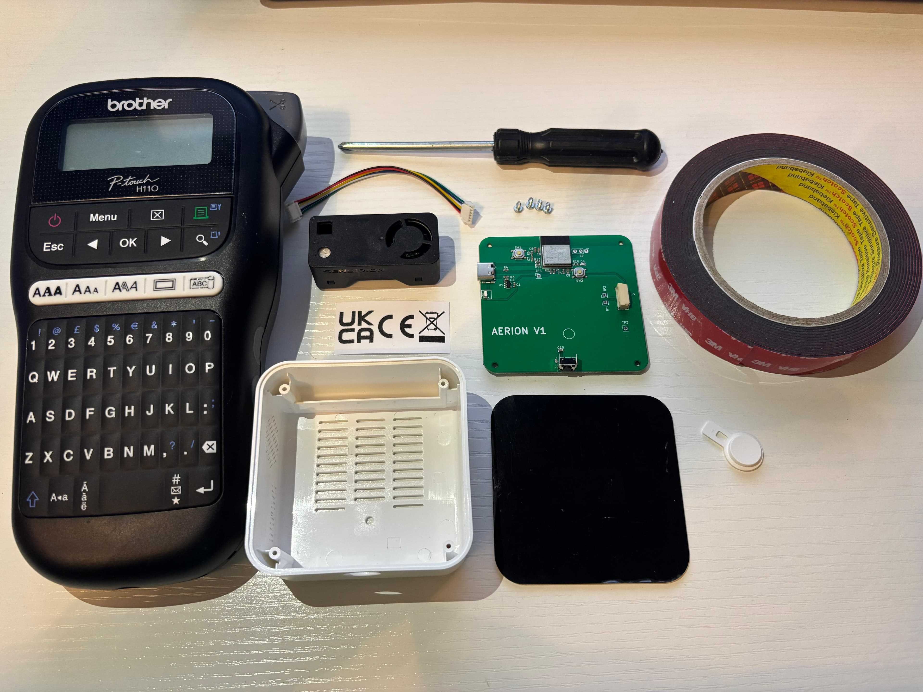 Aeroshi monitor parts laid out for repeatable assembly